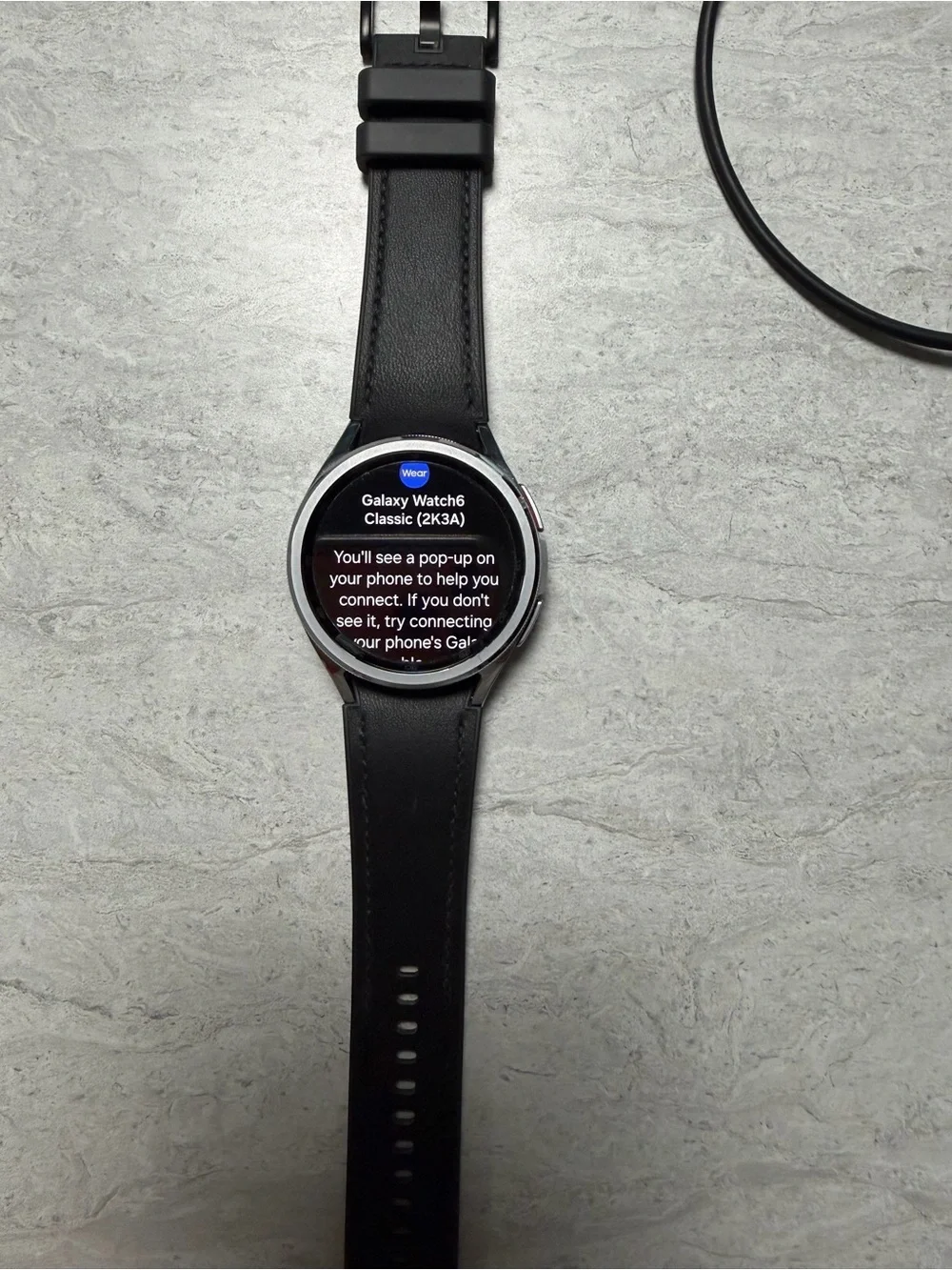 Samsung Smartwatch with Silver Case and Black Strap